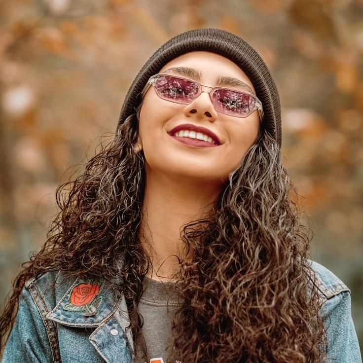 Avery Chen, Lead Design Curator at Modern Life Style Chronicle, reviewing corporate floral arrangements